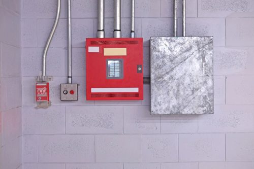 fire alarm switch on wall. Electrical Conduit & PVC Conduit